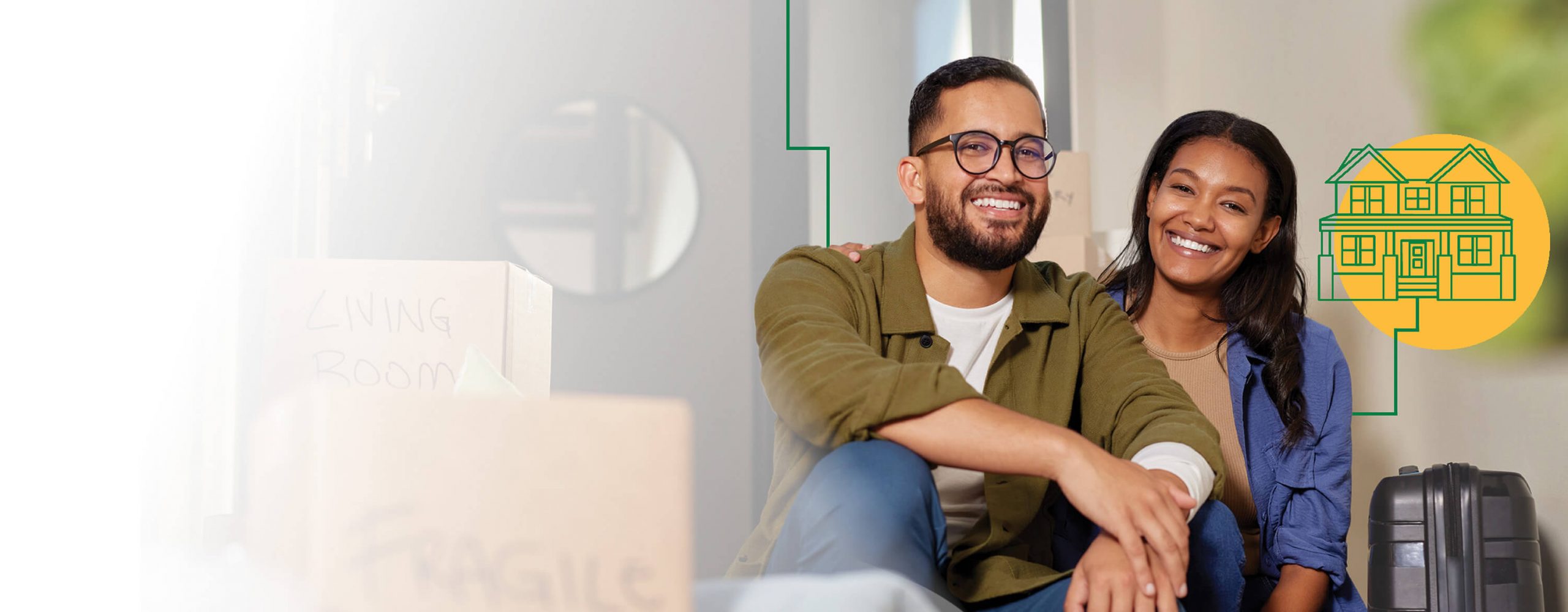 A couple sitting in a room with their luggage ready to apply for a new home loan.
