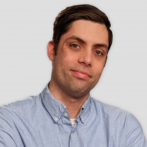 A headshot of Corey Moquin.