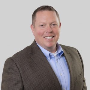 A headshot of Mike Oleksak.
