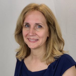 A headshot of Judy Taylor.