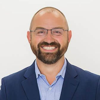 A headshot of Michael Mahlert.