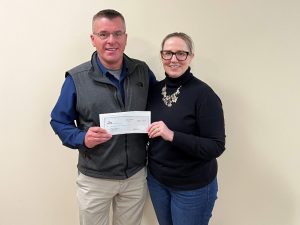 A check donation to Westfield Public Schools from from our charitable giving program, The Giving Tree. 